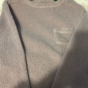 Purple Cuddl Duds sweater with pocket